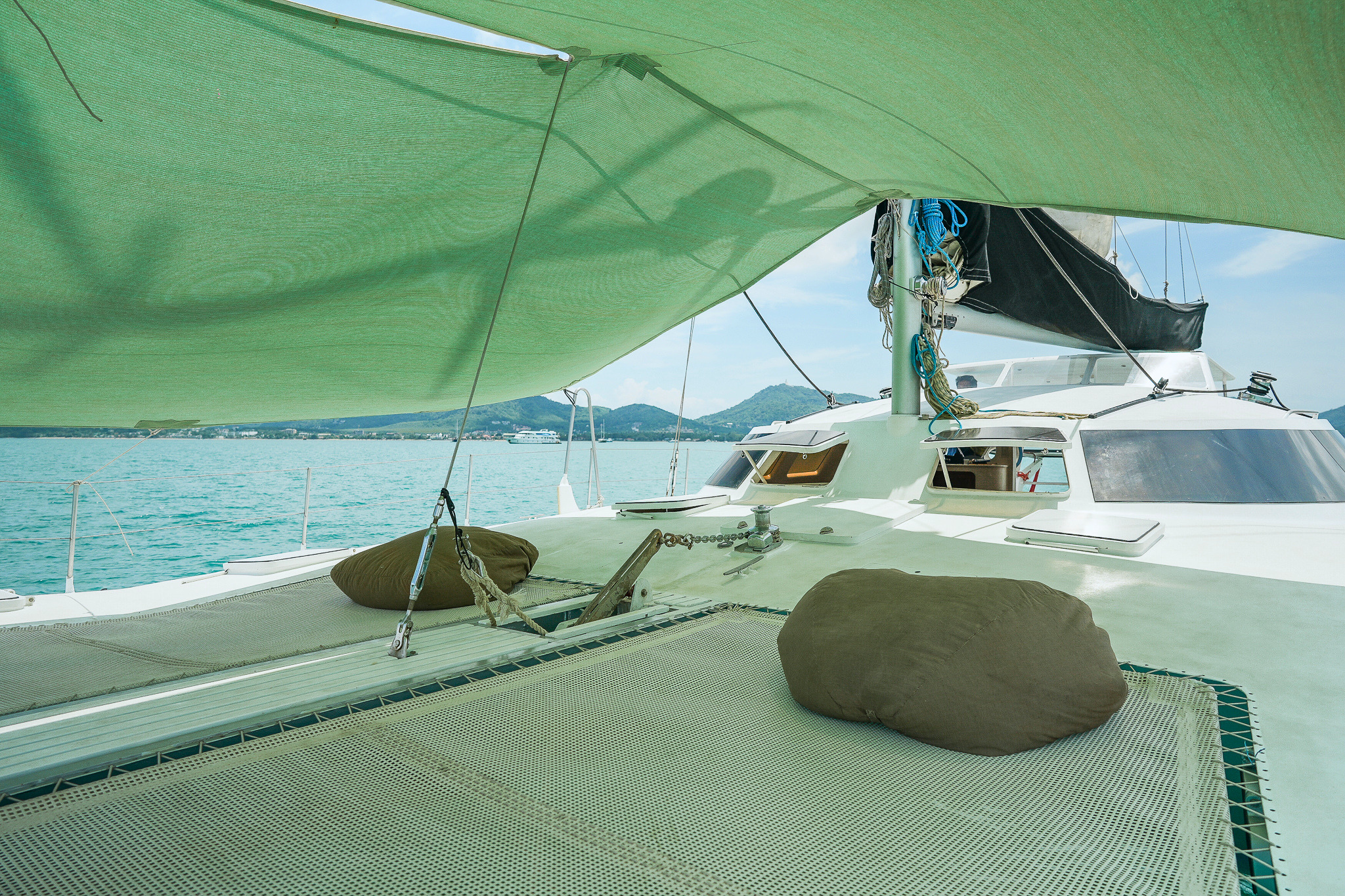 SY Shindig foredeck with bean bag loungers and shaded trampoline
