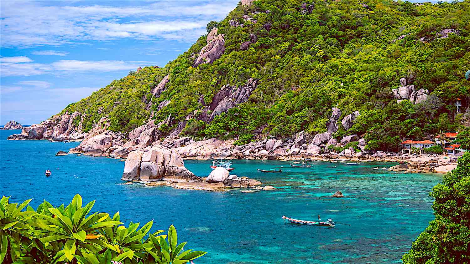Dramatic rocky bay of Tanote with boulders and turquoise water