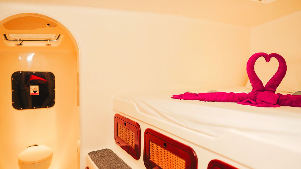 SY Shindig guest cabin with ensuite bathroom and heart-shaped towel decoration